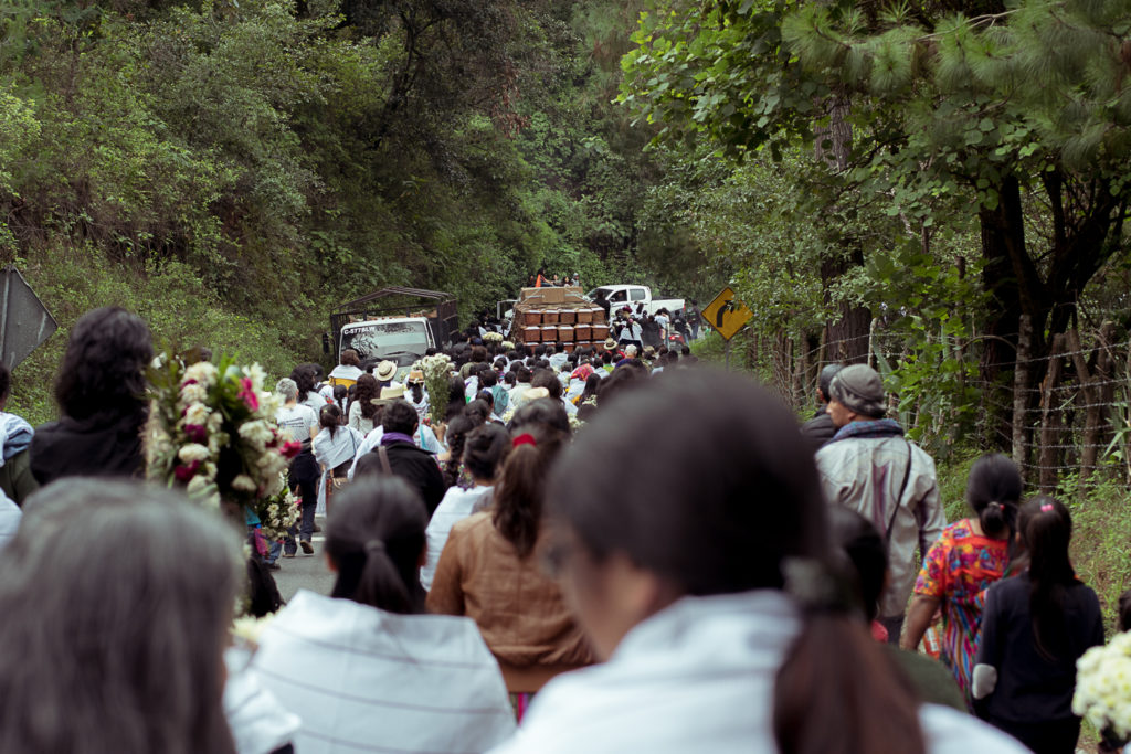 Photo by Alejandro Flores. This shows the scene of a funeral procession.