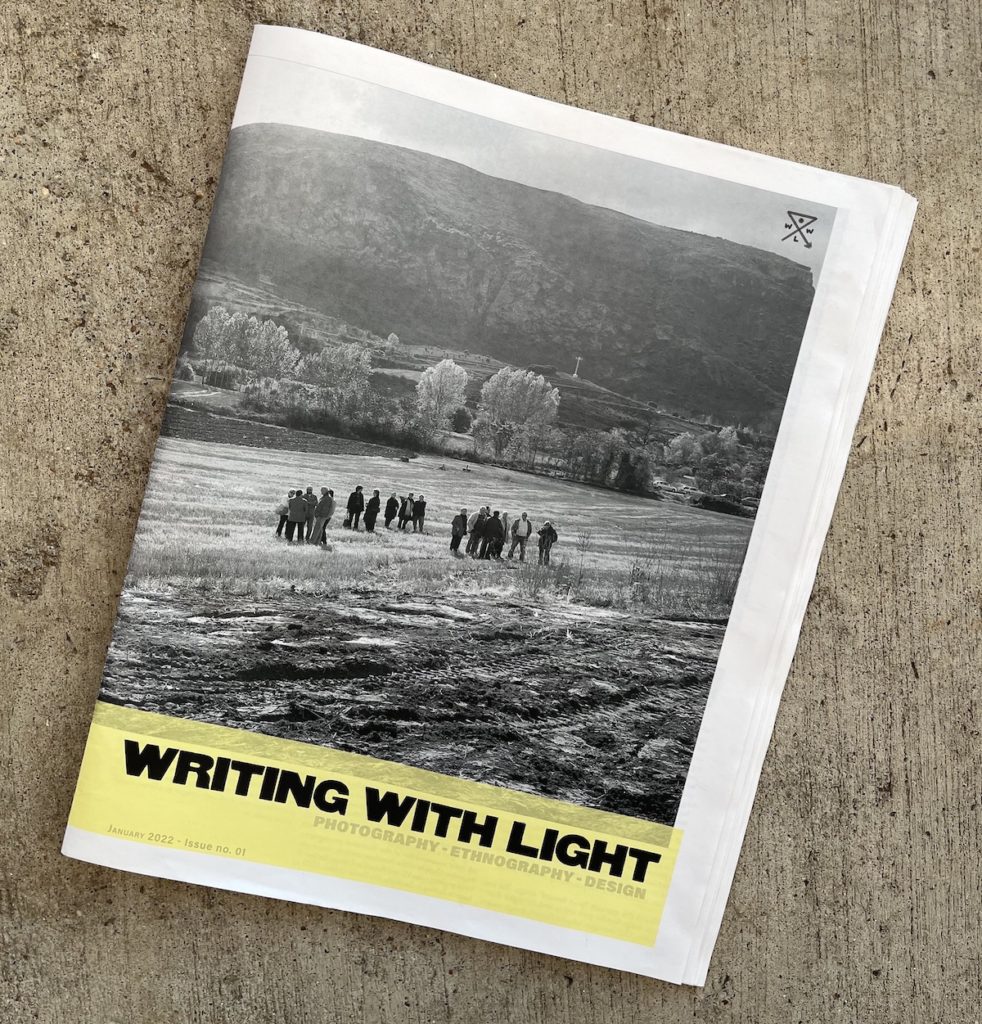 A photograph featuring the cover of the writing with light magazine, January 2022.
